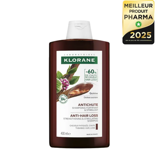 Klorane anti-hair loss shampoo bottle with label and certification badge
